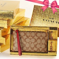 COACH C LOGO皮革大型手拿包+雙吊飾(熊/雪花)禮盒組-卡其/紅