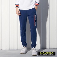【NAUTICA】COMPETITION素面撞色LOGO運動長褲(藍色)