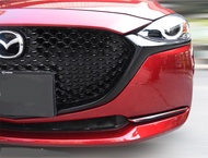 ชุดแต่งกระจังหน้าและคิ้วใต้กะจัง Mazda 2
