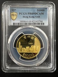 1997年回歸紀念金幣．PCGS PR69DCAM．連原盒原證