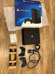 PS4 PRO 1TB w/2 DualShock4 controller well used