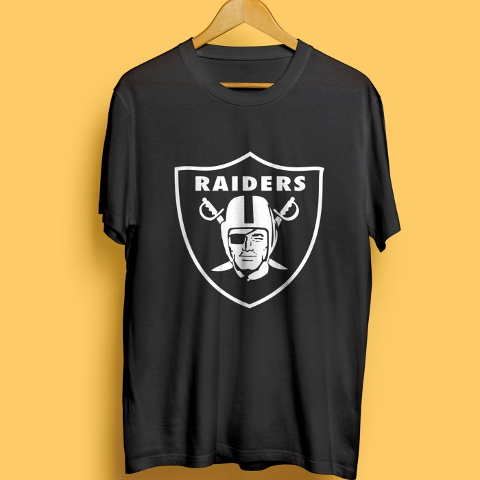 Oakland Raiders on an abraded steel texture T-Shirt by Movie Poster Prints  - Fine Art America