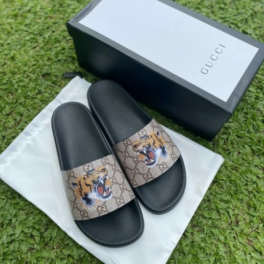 gucci slides lion