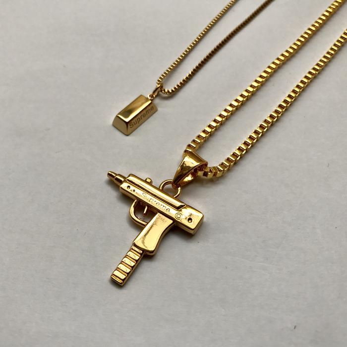 supreme uzi necklace